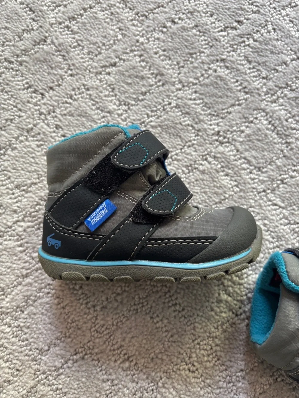 See Kai Run Kids Waterproof Winter Boots in Black with Teal Lining